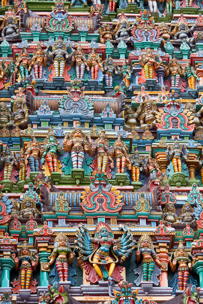 印度寺庙塔上的雕塑雕像寺庙神灵浮雕石头上帝图片