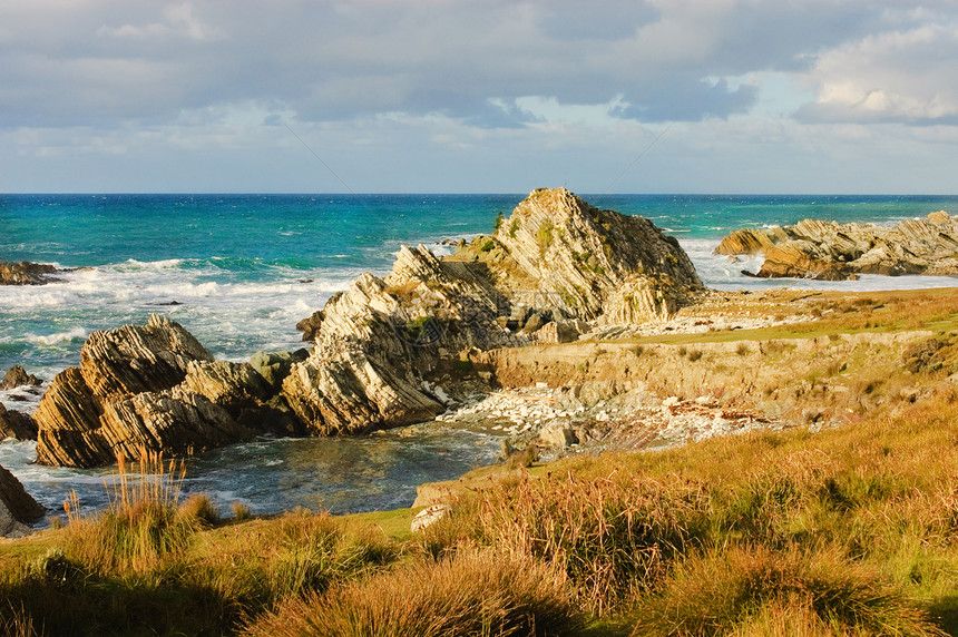 新西兰的瓦亚拉帕地质学蓝色分层多层海岸棕色地层沿海石头时间图片