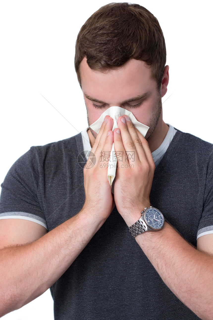 吹鼻孔的年轻人持有黑发成人咳嗽打击疾病流鼻涕过敏感染鼻子图片
