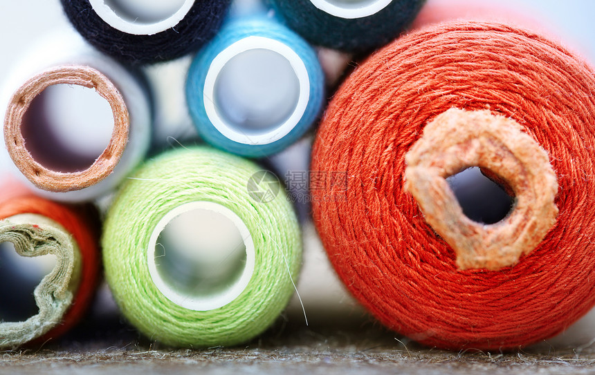 缝线池缝纫工艺蓝色工具爱好棉布乐器宏观刺绣剪裁图片