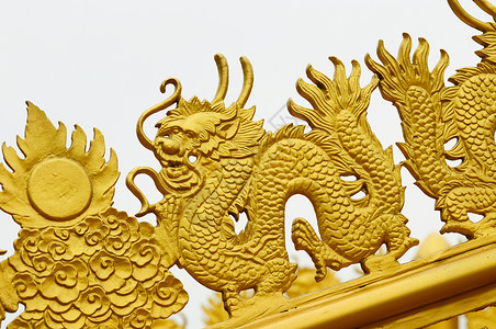 龙雕寺庙金子宗教文化艺术雕塑旅游佛教徒雕像黄色背景图片