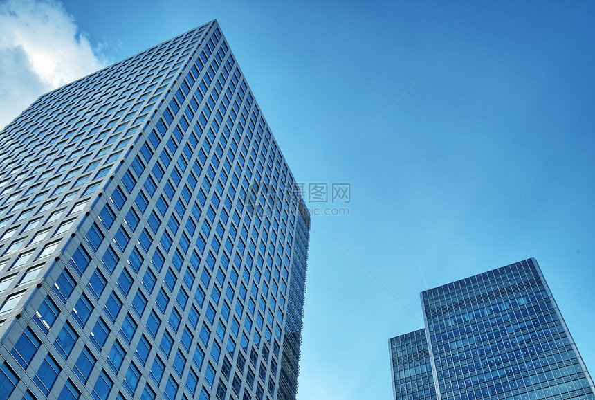 伦敦的加那利码头金融区大楼小狗商业建筑物市中心城市窗户蓝色办公室旅行景观图片