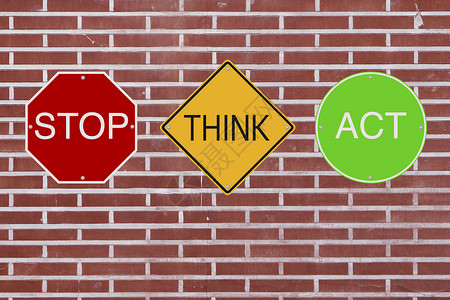 伤害路标停止思考动作砖墙黄色危险交通路标红色概念安装安全绿色背景
