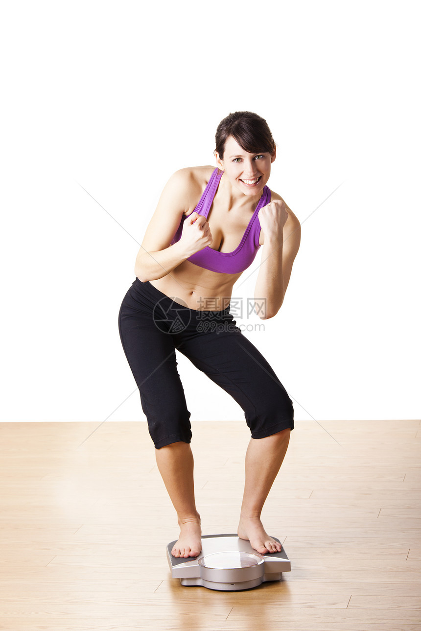 运动快乐的女孩福利女性营养橘皮组织重量身体青年训练微笑图片