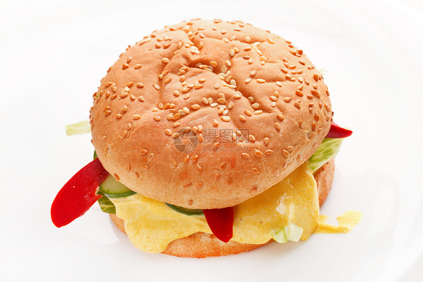 白色的汉堡包小吃洋葱牛肉牛扒营养面包火腿芝麻饮食胡椒图片
