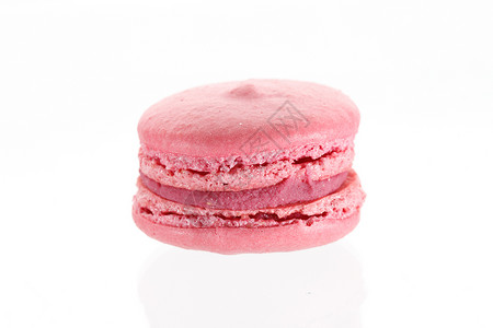 法国马卡糖果糕点美食奶油粉色饼干食物杏仁甜点背景图片