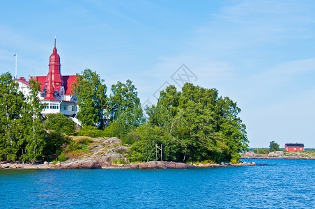 赫尔辛基海景绿色红色海岸支撑岩石高清图片