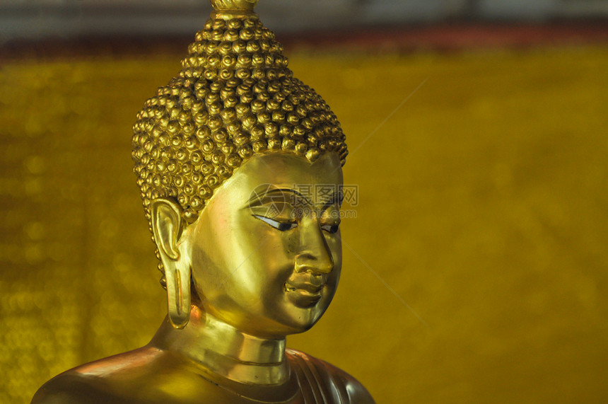 金佛像的面容信仰钦佩古董宗教墙纸定居古玩艺术文化佛教徒图片