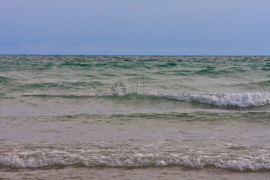 沙滩和热带海冲浪阳光海洋假期海岸蓝色晴天海浪旅游天空图片