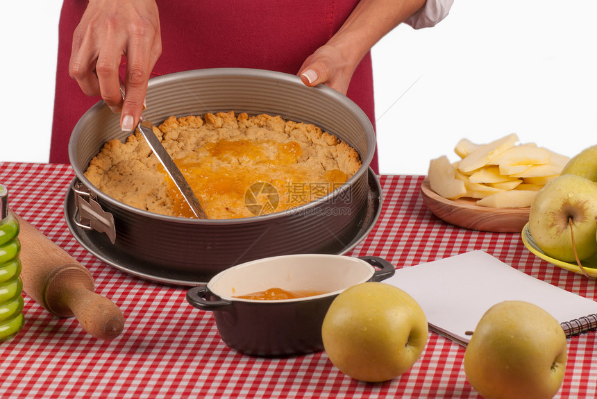 苹果派面团上传播橘子酱蛋糕擀面杖烘烤馅饼女性厨师糕点烹饪料理传播图片