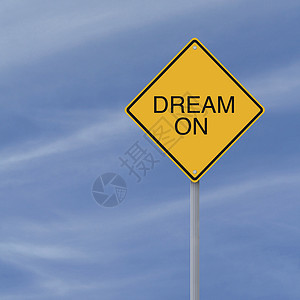 梦想在梦中动机标志路标钻石警告黄色交通天空蓝色背景图片