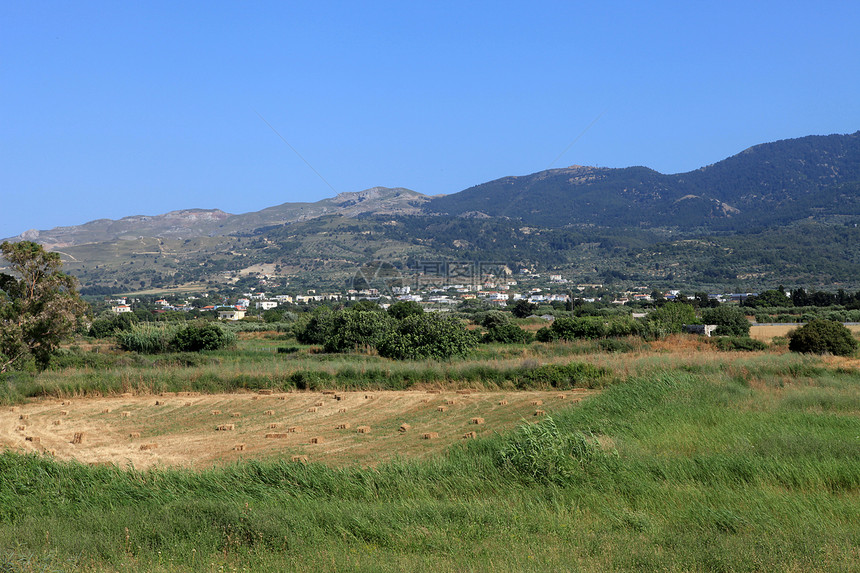希腊科斯岛Zia的典型希腊村住宅蓝色丘陵观光山脉村庄旅游岩石建筑学白色图片
