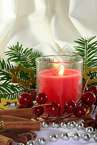 圣诞节装饰橘子片情绪庆典星星蜡烛派对杉树背景图片