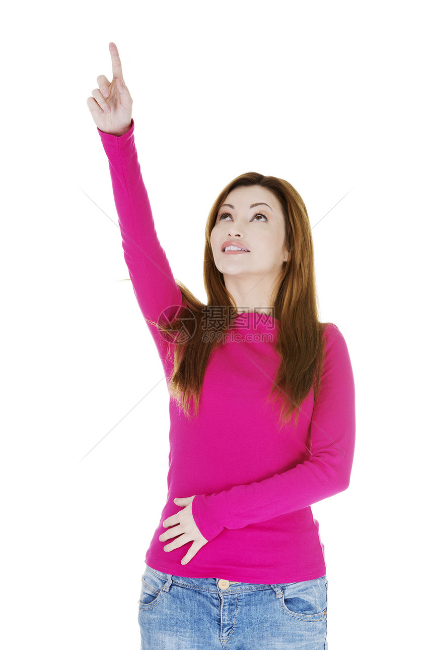 快乐 兴奋的女人指着复制空间手势商业成人喜悦产品白色女孩手臂广告黑发图片