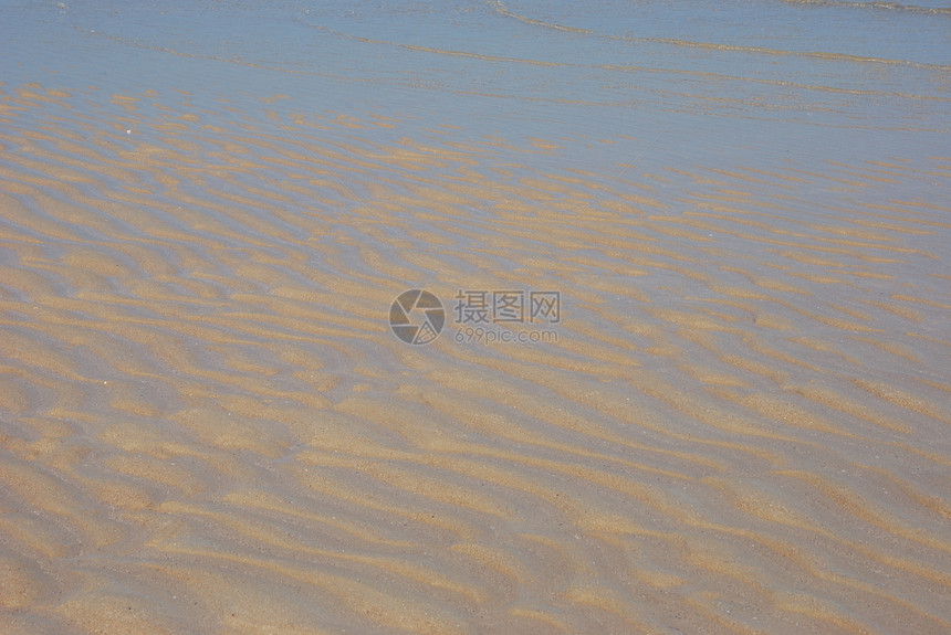 有标记的沙沙蓝色地质海岸图片
