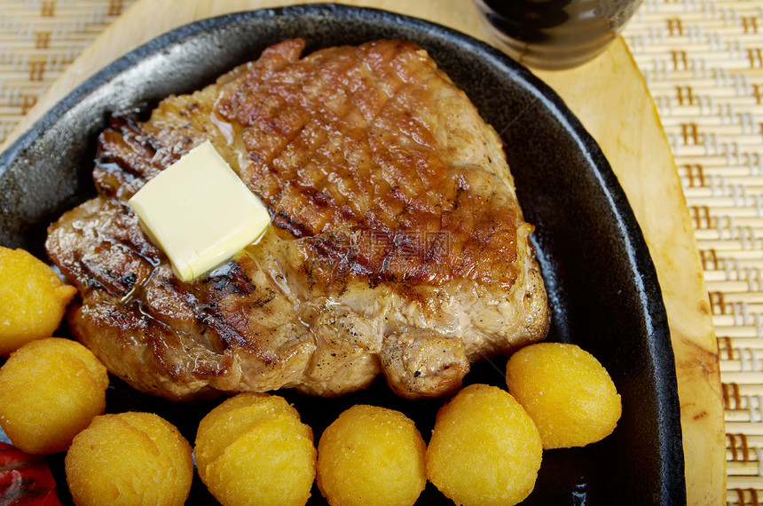 日本猪肉牛排美食叶子餐厅肋骨午餐蔬菜头皮盘子用餐烹饪图片