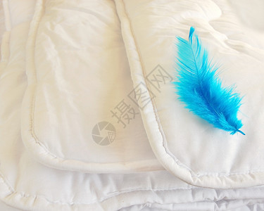 白折叠织物卧室重量青色羽毛床单质量蓝色寝具背景图片
