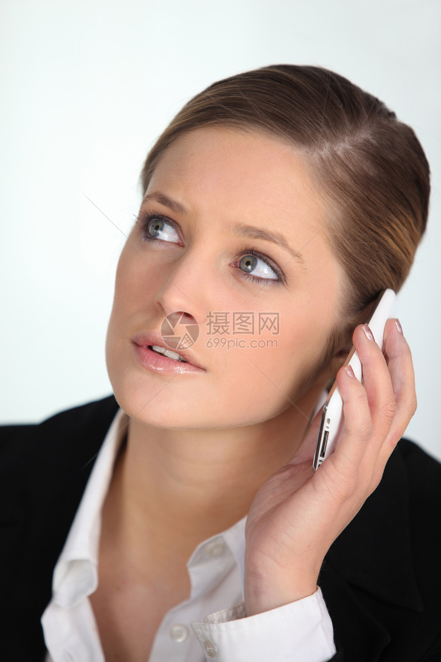 在电话上说话的女商务人士手机袖口分歧人士并发症客户白色坏消息苦恼女士图片