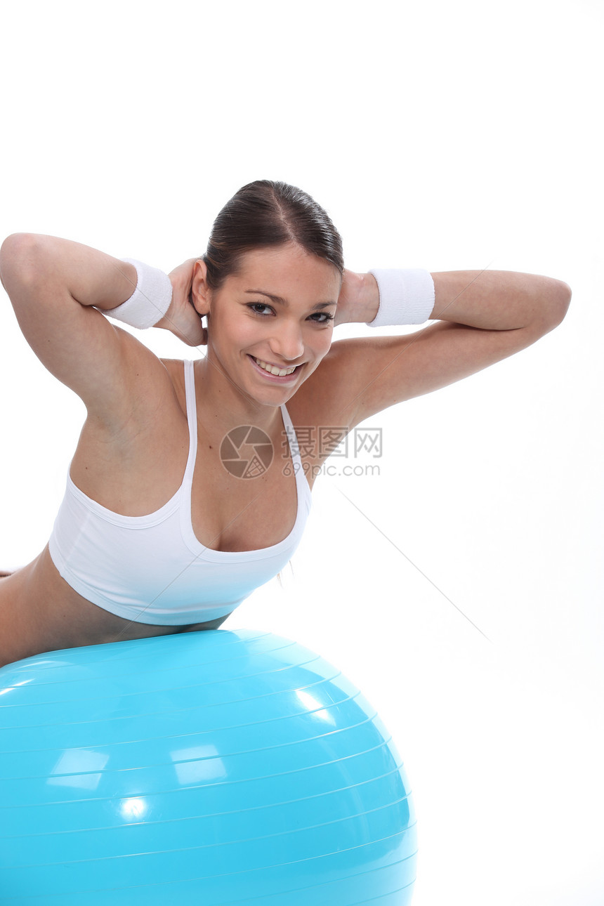 蓝色气球上女孩的平衡图片