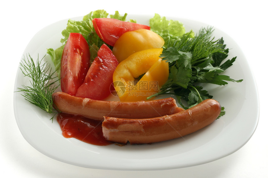 带蔬菜的香肠黄色胡椒红色油炸盘子食物香菜图片