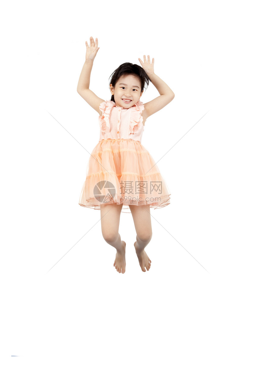 欢乐的亚洲人小跳跃在空气中图片