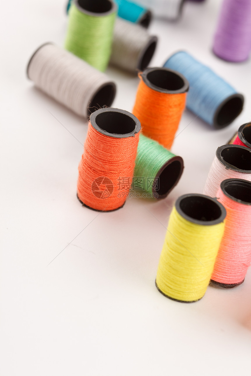 诱饵线的柱状刺绣工作裁缝针线活材料丝绸工艺气泡细绳彩虹图片