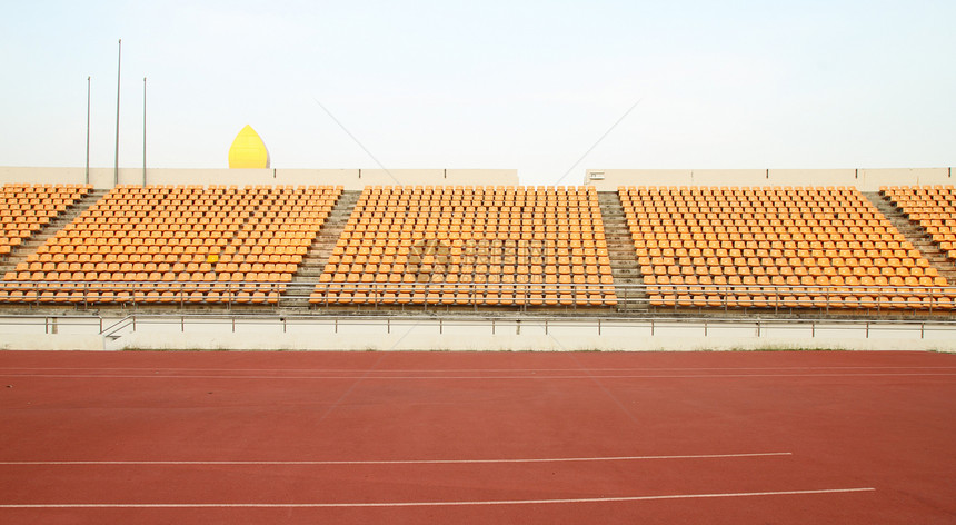 运动体育场座位观众足球蓝色车道马戏团塑料音乐会团体民众橙子图片