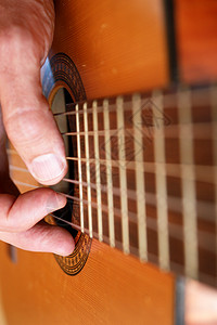 吉他语木板脖子木制品乐器指板闲暇音乐艺术细绳文化背景图片