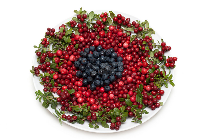 盘子上的棕莓和白莓图片
