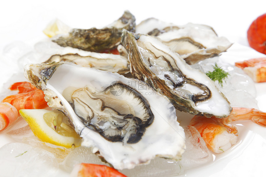 冰上新鲜海鲜海洋柠檬餐厅市场盐水盘子宏观奢华营养牡蛎图片