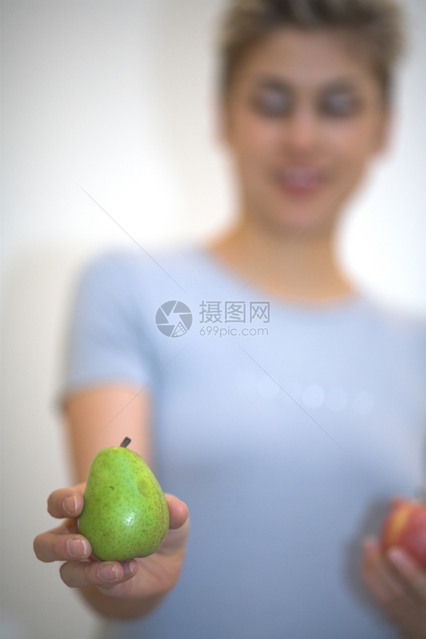 妇女梨和苹果圆形金发吸引力女孩头发红色食欲水果诱惑食物图片