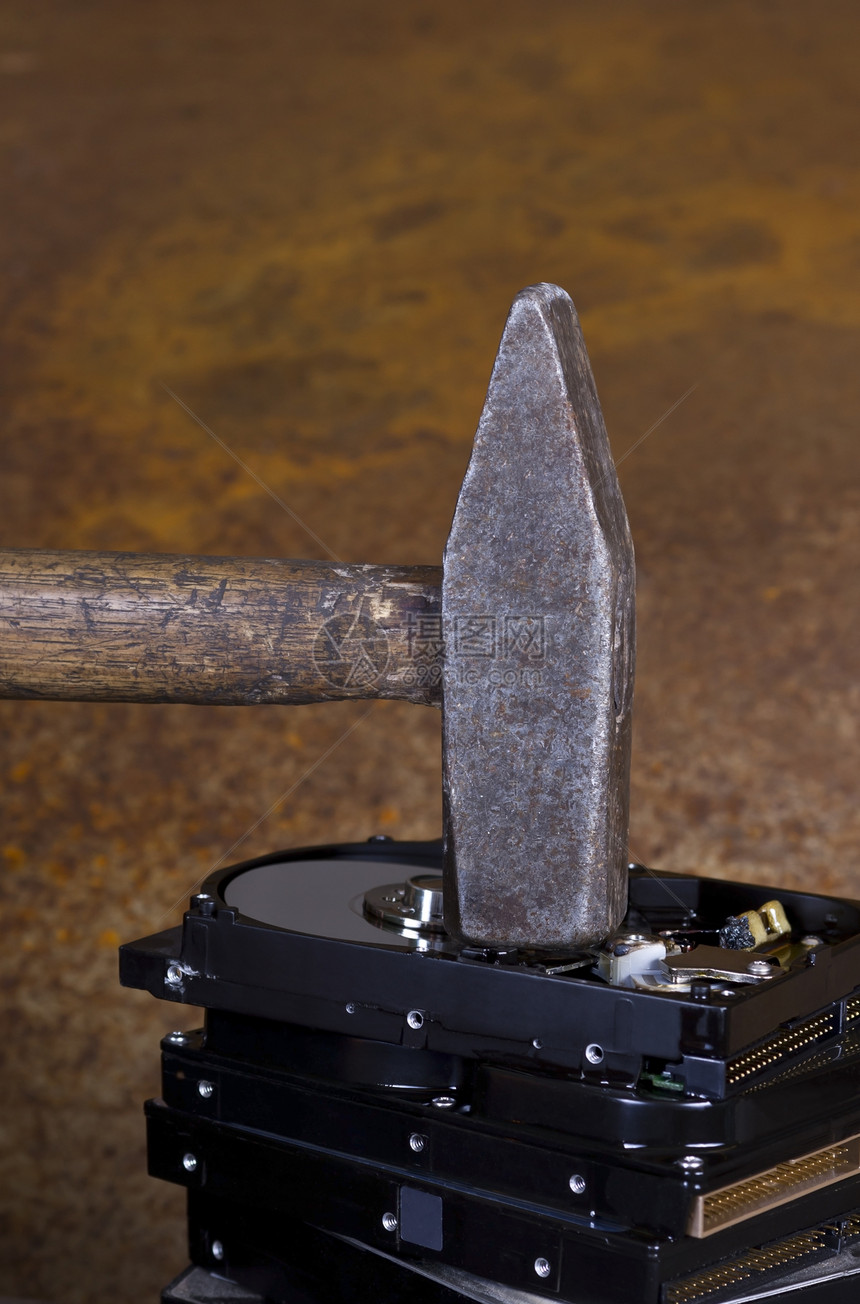 硬盘堆积的锤子内存磁盘金属工作雪橇乐器部分大容量电子工具图片