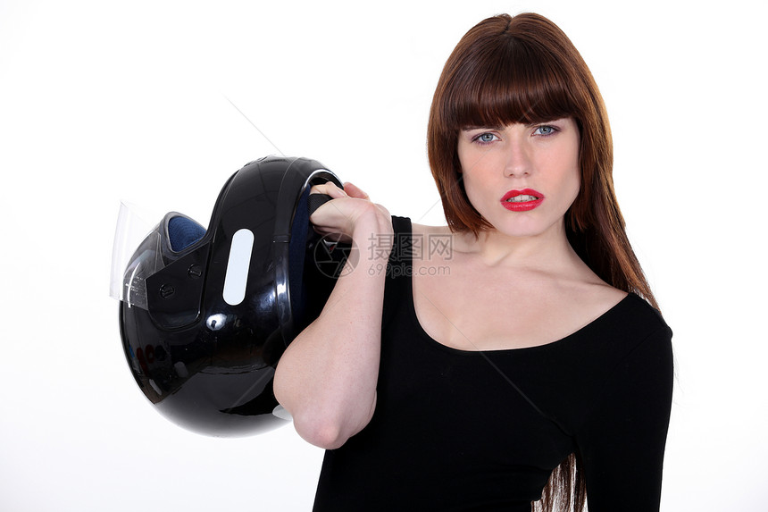 带着摩托车头盔的有吸引力的女人图片