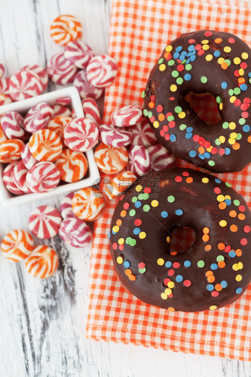 甜甜圈面包食物餐巾育肥巧克力糖果圆圈团体肥胖静物图片
