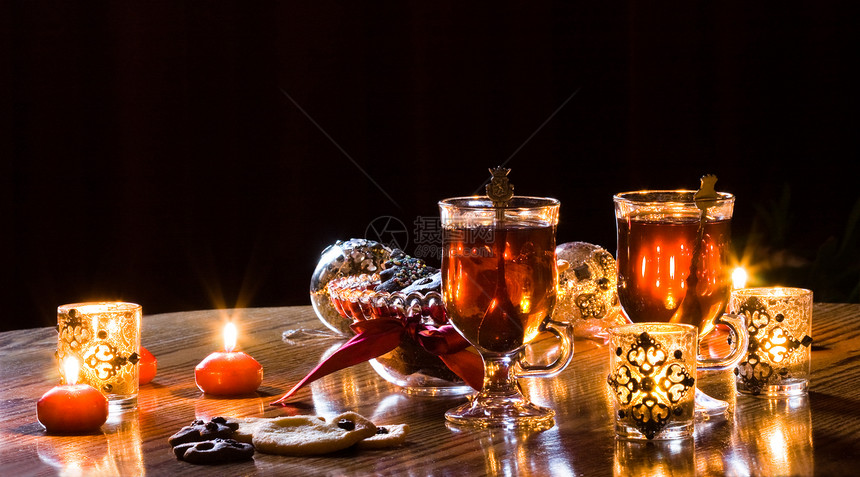 茶茶时间和自制饼干时候蜡烛照片反射温暖棕色火焰图片