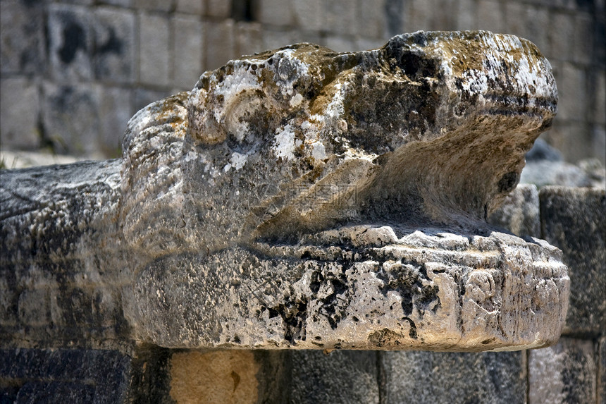 抽象的墨西哥蛇头历史艺术旅行切口岩石颅骨石头纪念碑城堡假期图片