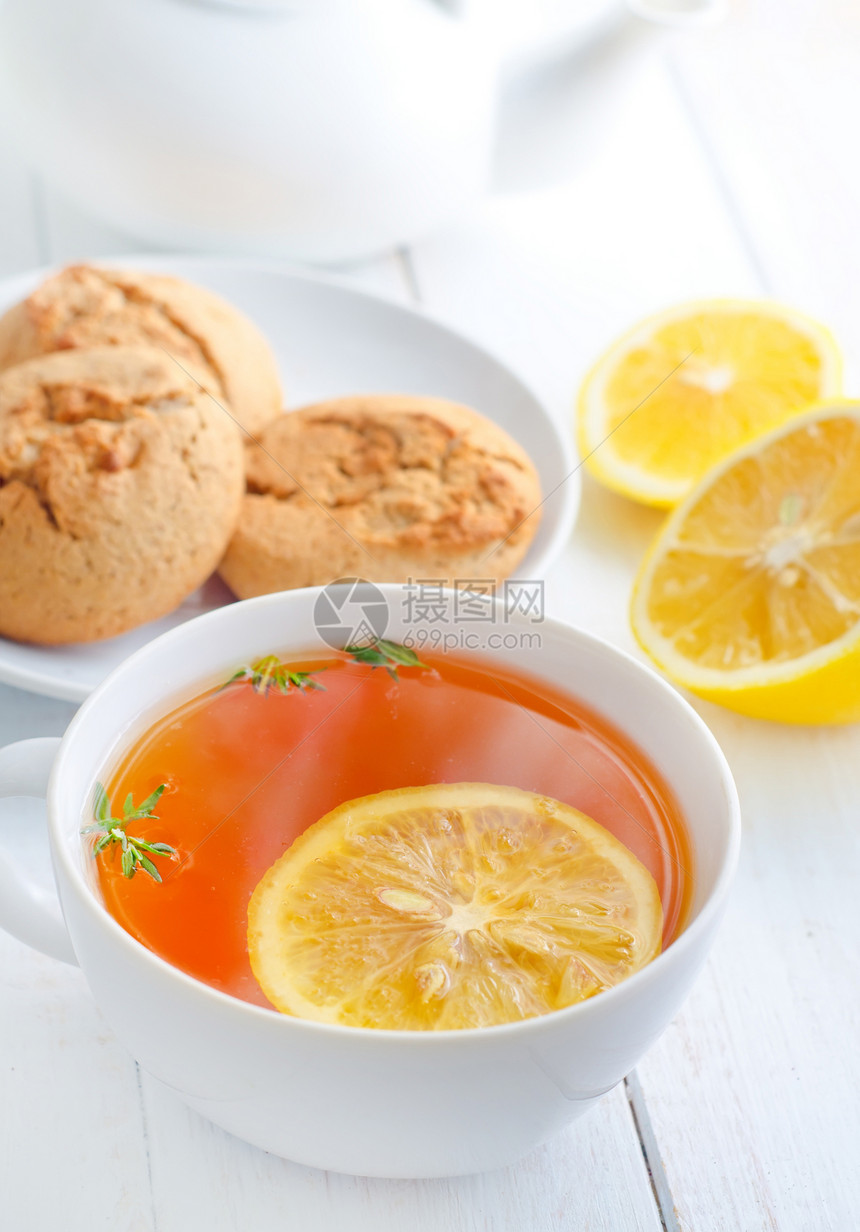 白杯里加柠檬的清茶刺激陶器芳香黏土百里香香气饮料飞碟早餐液体图片