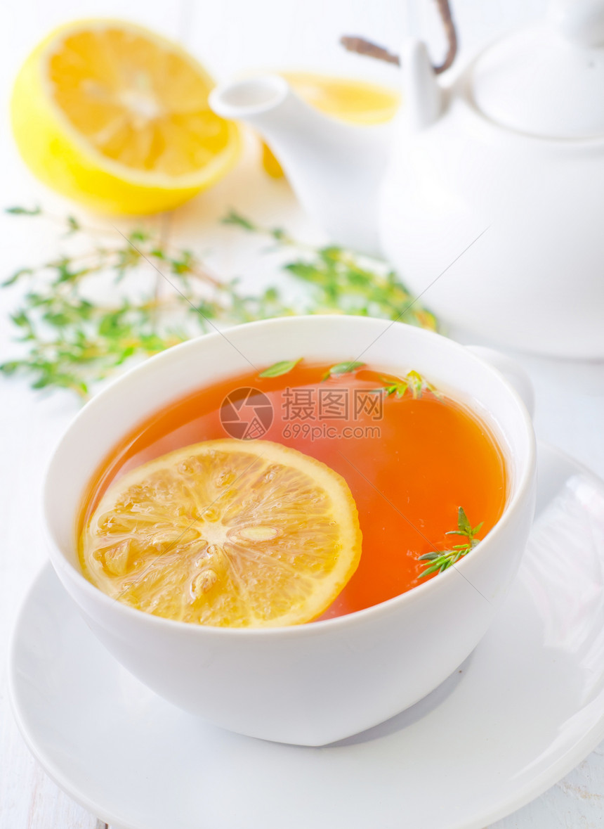 白杯里加柠檬的清茶液体香气陶器竹子黏土早餐兴奋剂刺激饮料飞碟图片
