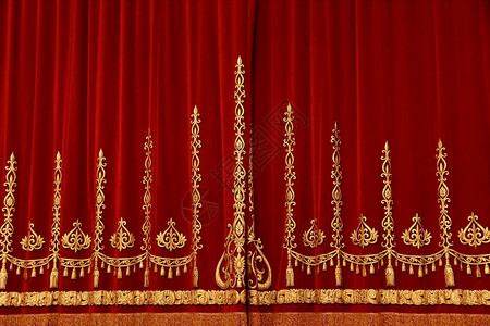 戏剧红幕红色椅子金子纺织品艺术装饰品剧院天鹅绒背景图片