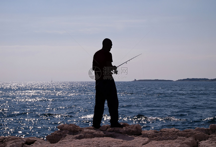 渔民天空渔夫男性运动垂钓者娱乐闲暇淡水支撑反射图片