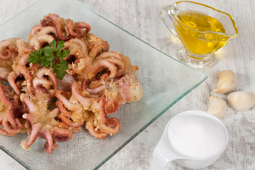 Fried 章鱼动物油炸美食餐厅食物乌贼海洋硬皮白色触手图片