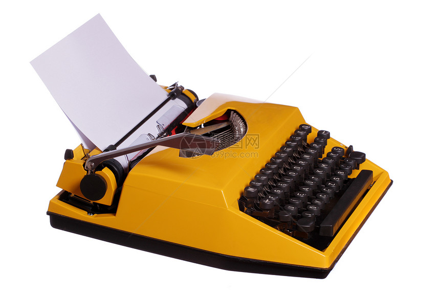 有纸张的旧黄色打字机图片
