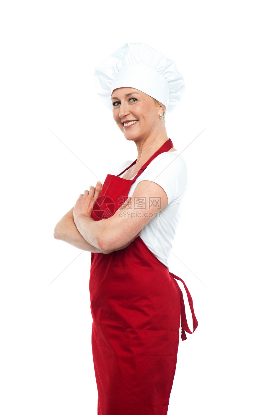 充满自信的女厨师冒充快乐女性职业餐厅商业双臂转矩工作烹饪图片