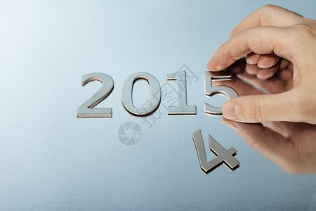 品牌新年概念数字手指金属背景图片