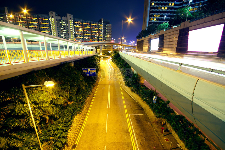 夜间城市地区曲线市中心交通建筑景观赛车立交桥车辆速度场景图片