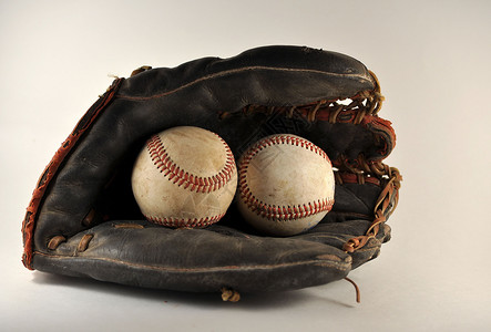 旧球与棒球手套皮革游戏背景图片