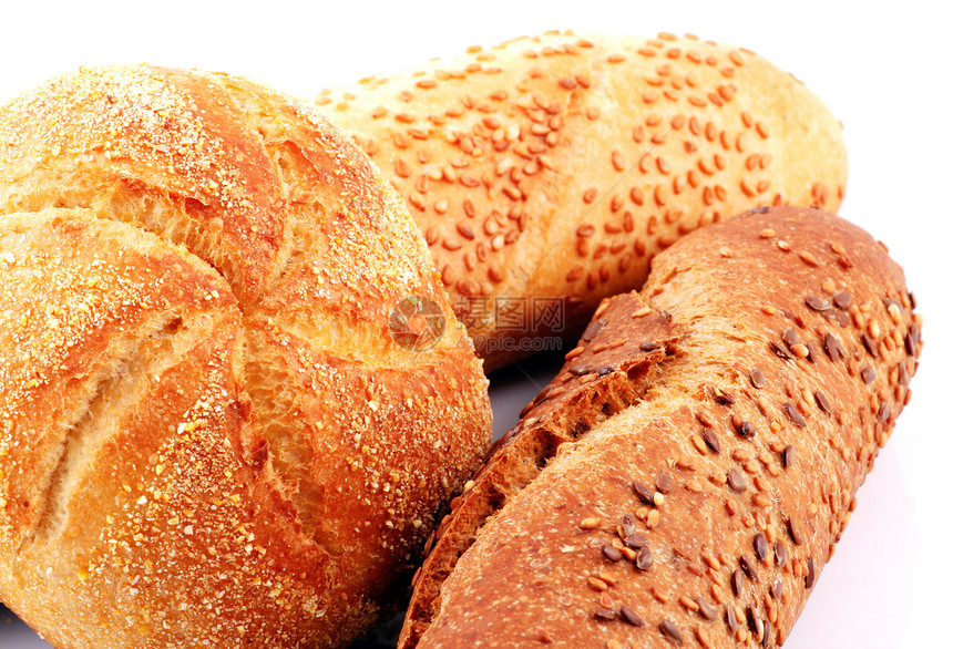 白色背景上孤立的新鲜面包工作室谷物早餐粮食营养包子面团脆皮金子糕点图片