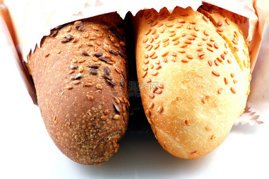 白色背景上孤立的新鲜面包金子包子种子美食小麦面包师脆皮谷物营养面粉图片