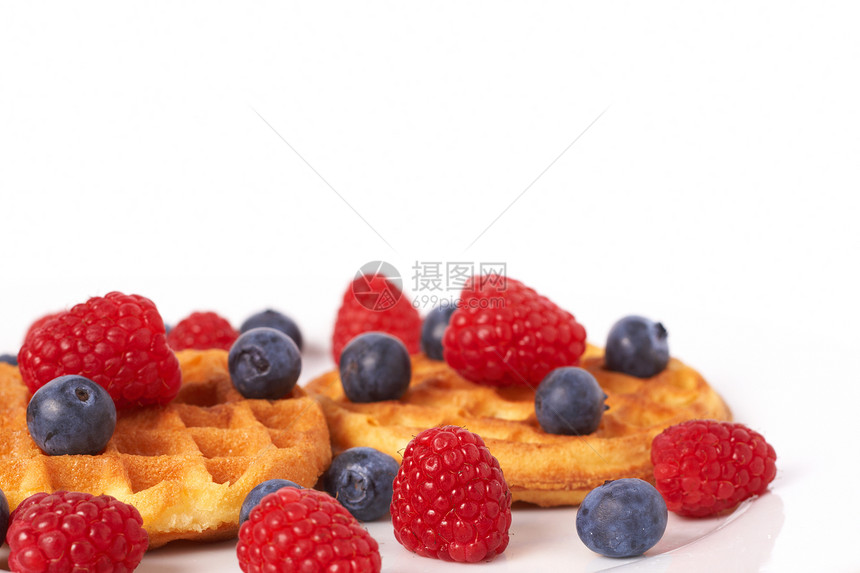比利时果浆和奶油华夫饼味道小吃饮食甜点蓝色糕点水果早餐营养覆盆子图片