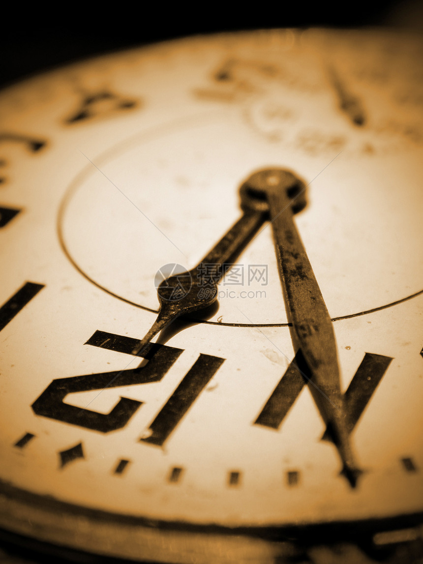 旧钟表圆形手表棕褐色古董机械数字时间小时图片